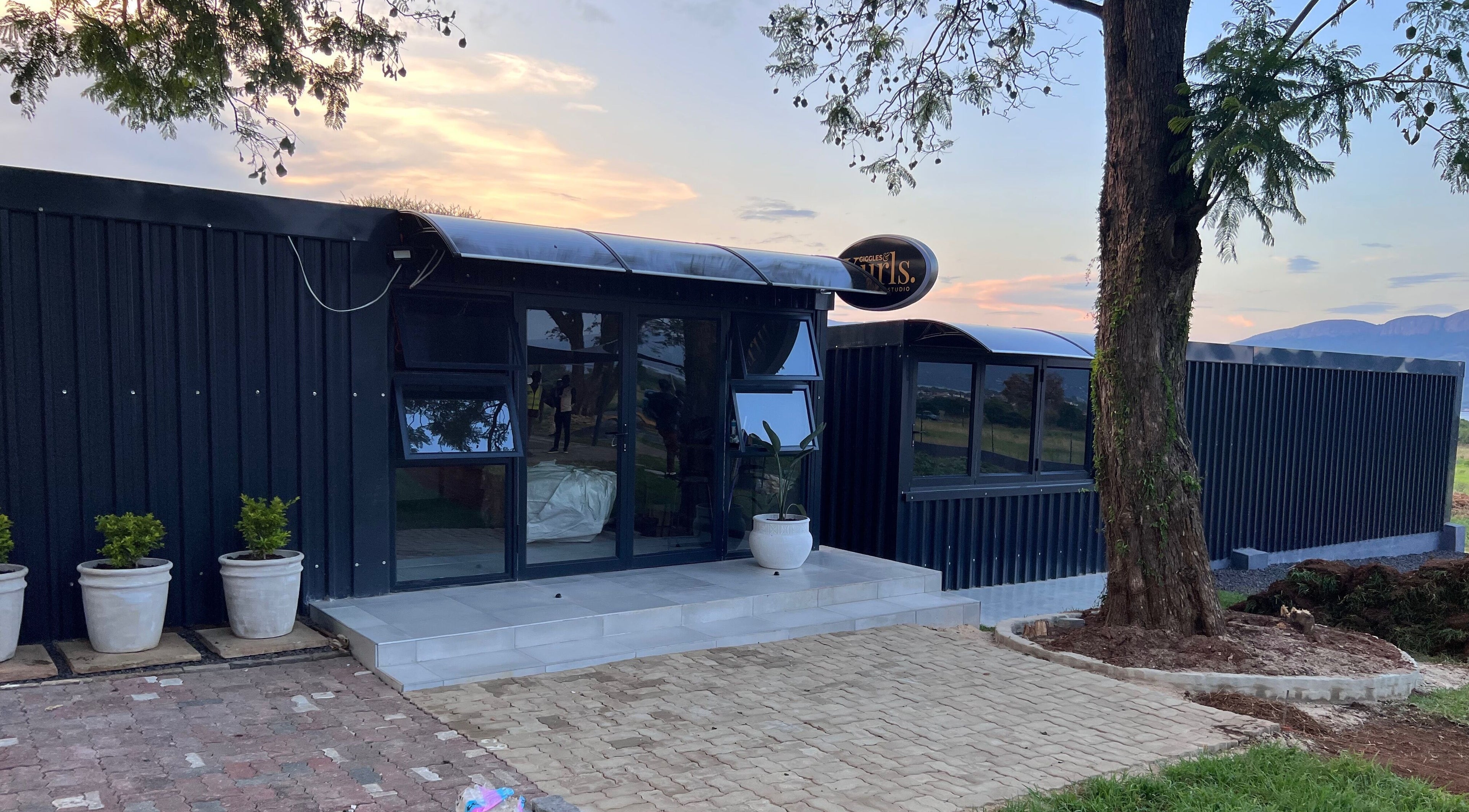 Modern exterior of Giggles n Kurls Nail Studio Hartbeespoort showcasing stylish facade in Hartbeespoort, North West, ZA.