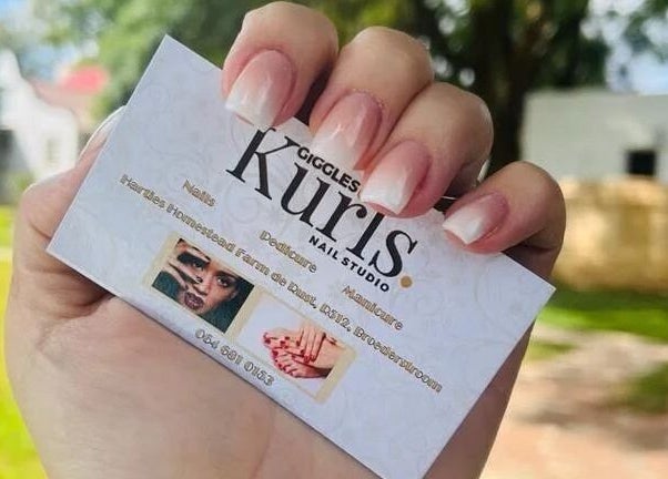 Elegant French manicure showcased with Giggles n Kurls Nail Studio Hartbeespoort business card in Hartbeespoort, North West, ZA.