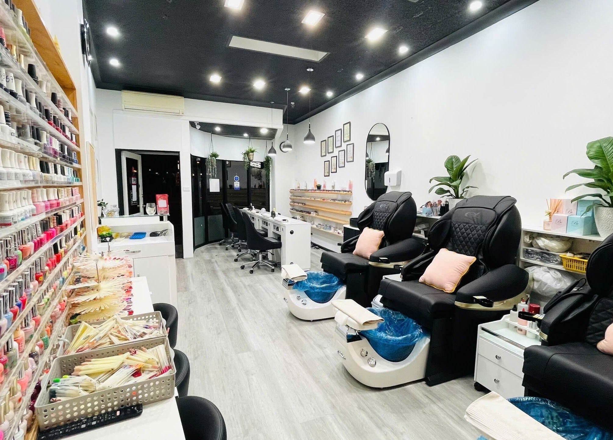 Elegant interior of Dazzling Nails and Beauty in Caringbah, New South Wales, AU showcasing nail polish collection.