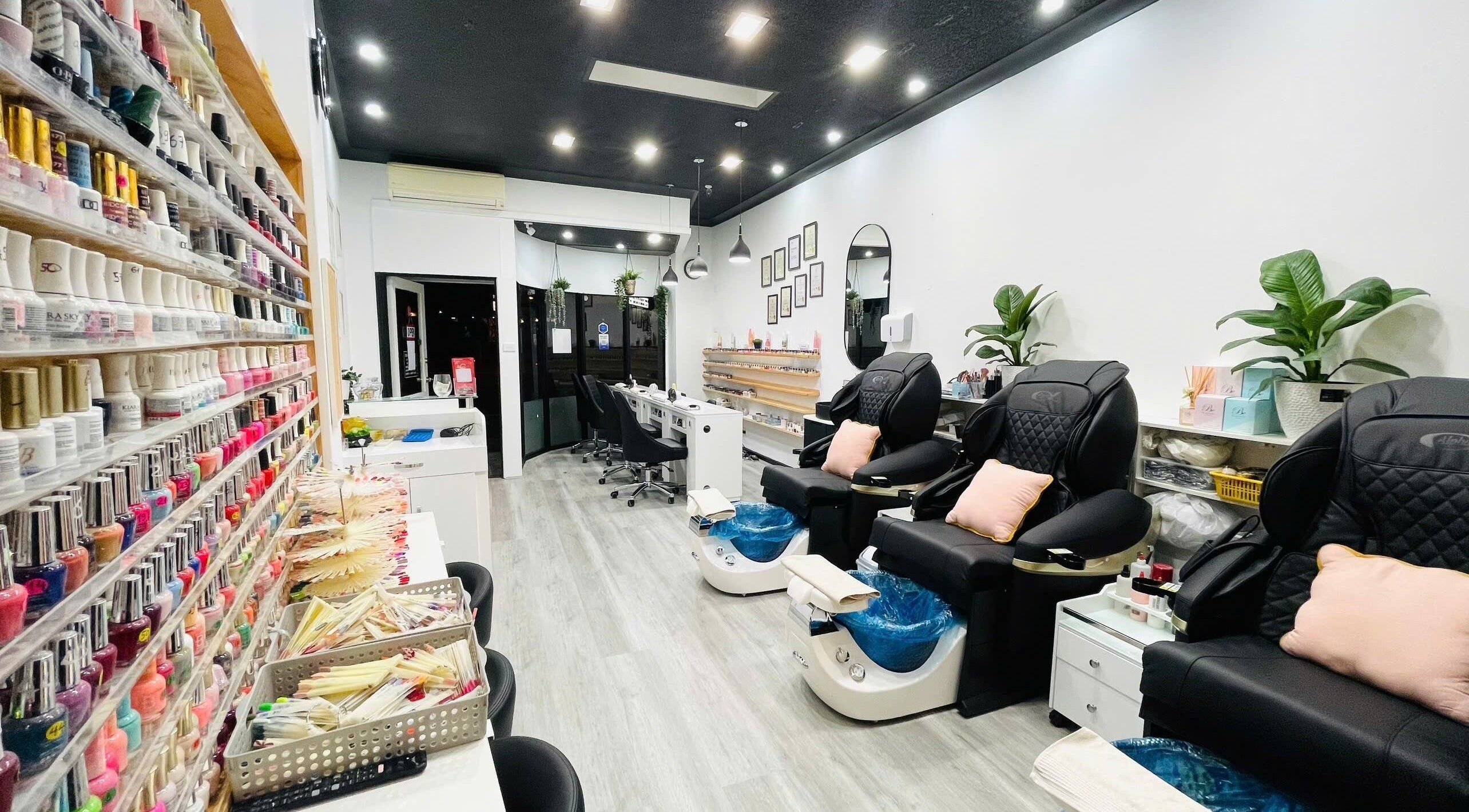 Elegant interior of Dazzling Nails and Beauty in Caringbah, New South Wales, AU showcasing nail polish collection.