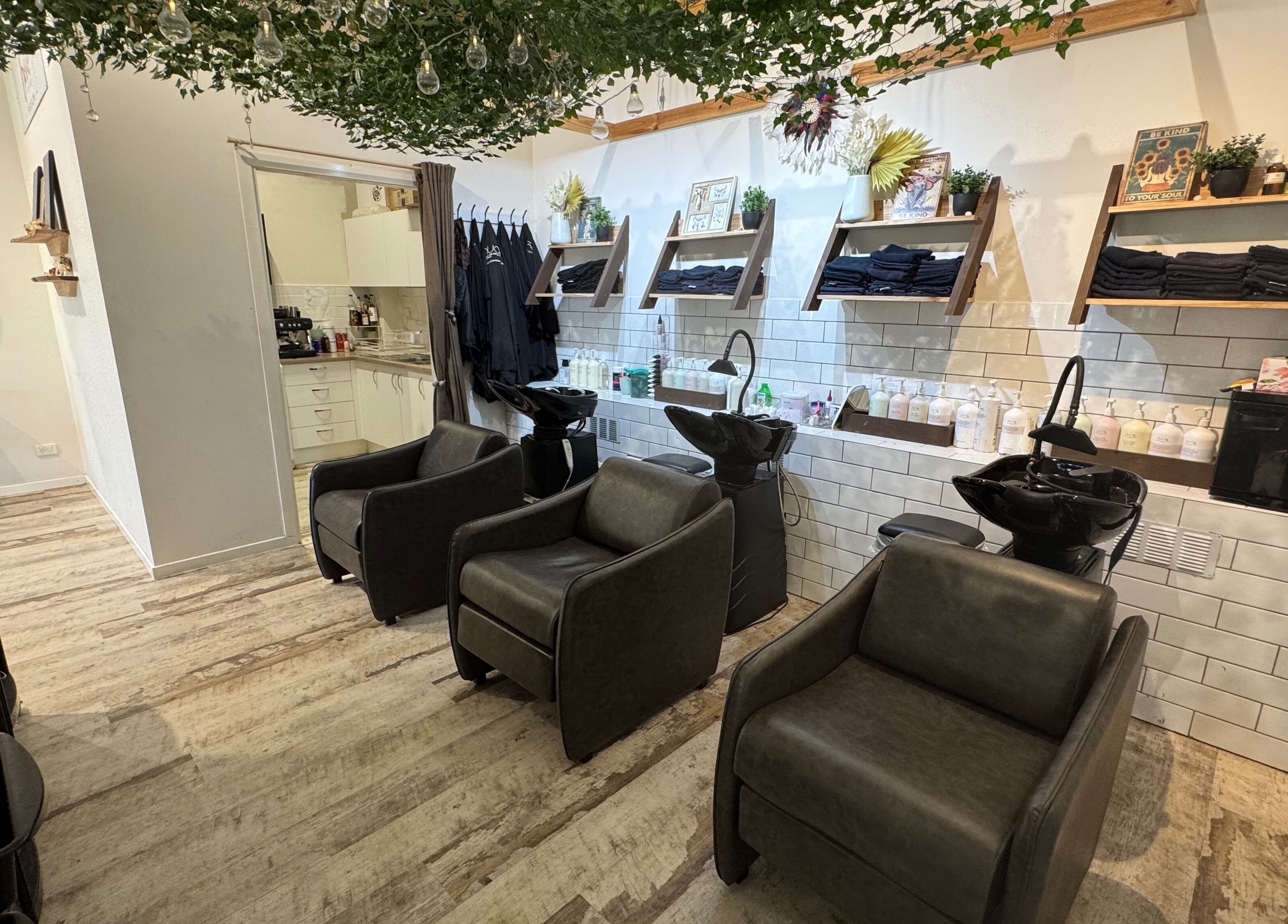 Modern interior with salon chairs at Boho Boutique Hair Salon, Yarrabilba, Queensland, AU.