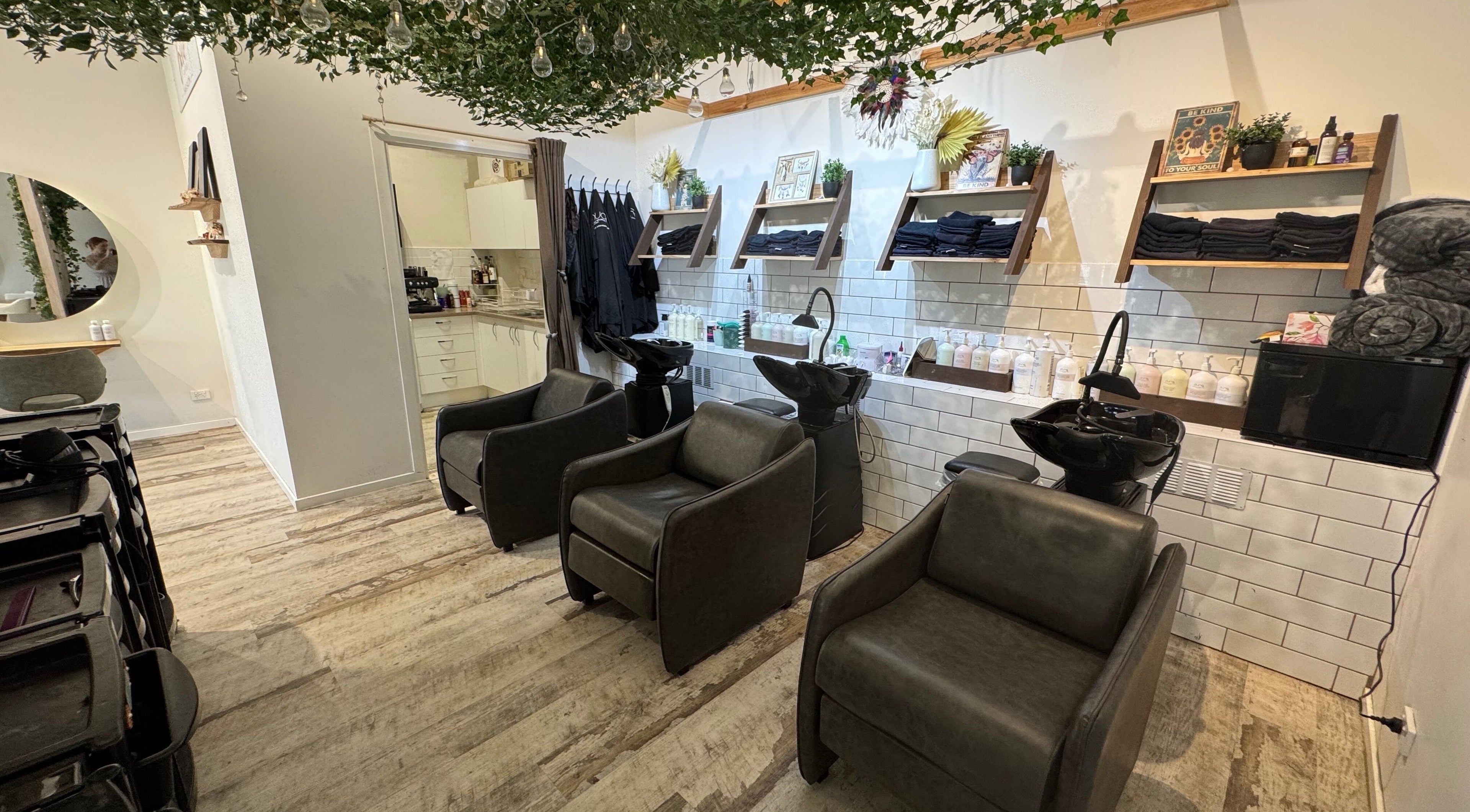 Modern interior with salon chairs at Boho Boutique Hair Salon, Yarrabilba, Queensland, AU.