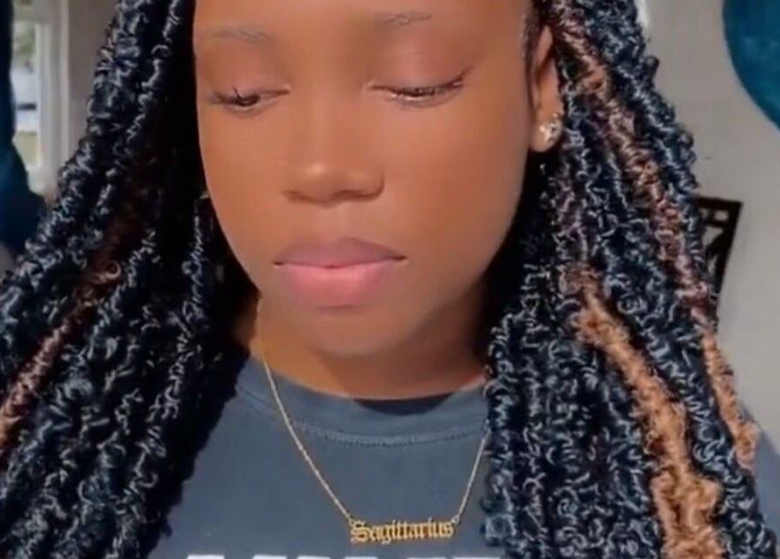 Stylish braided hairstyle by Royaltii Designs in Bridgetown, Saint Michael, BB, showcasing intricate braid work.