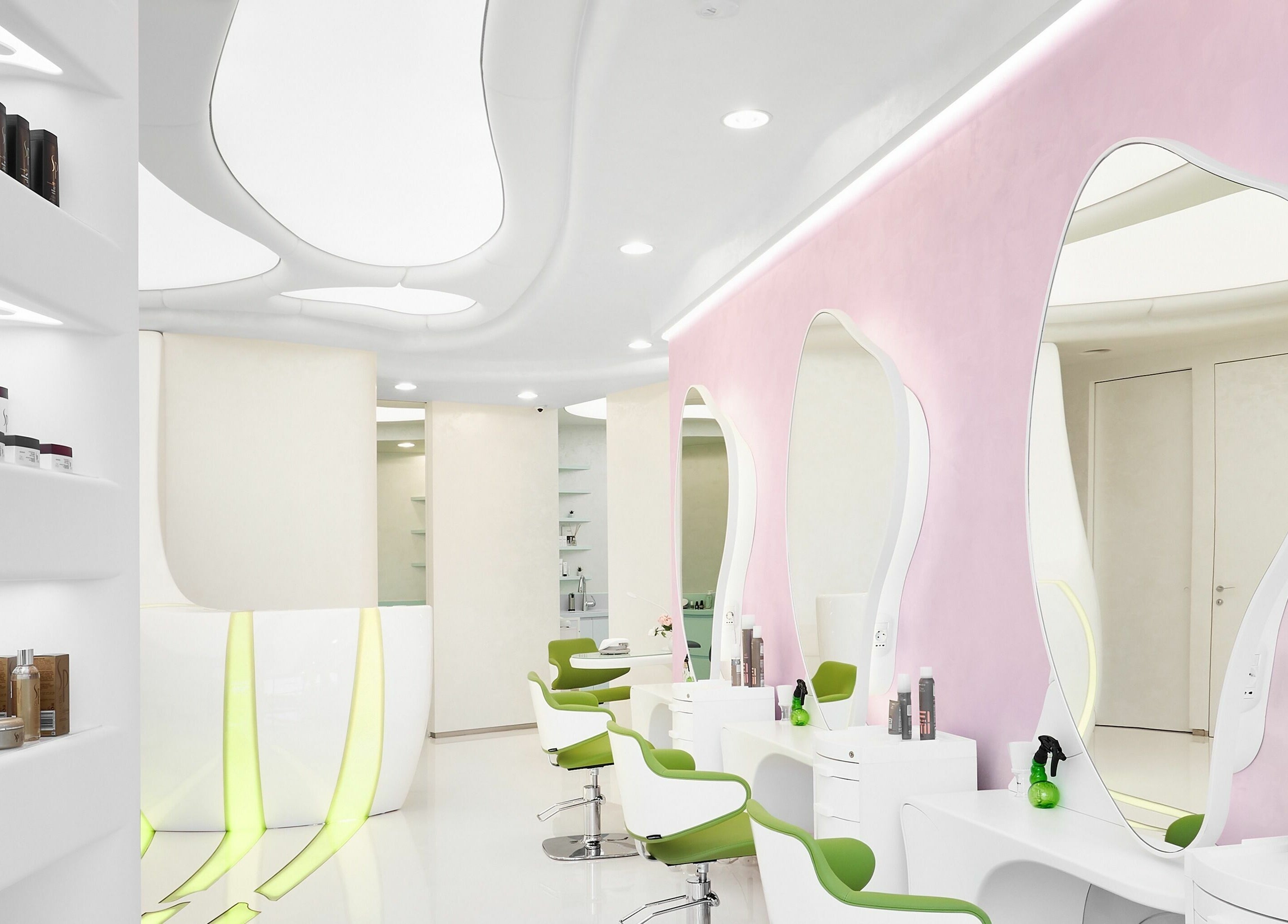 Modern salon interior at Hairspray, Sofia, Sofia City Province, BG, featuring stylish stations and vibrant decor.