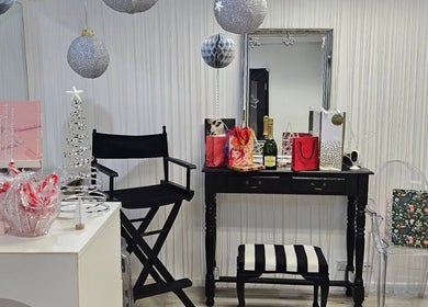 Elegant decor at Lash Bar, Bondi Junction, New South Wales, AU with gifts and holiday ornaments.