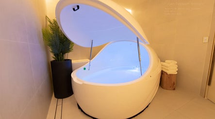 Relaxing float pod interior at Body WRL, Rosebery, NSW, AU, offering tranquil wellness sessions.