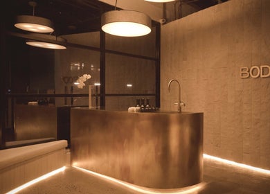 Elegant reception area at Body WRL, Rosebery, NSW, AU with modern lighting and sleek design.