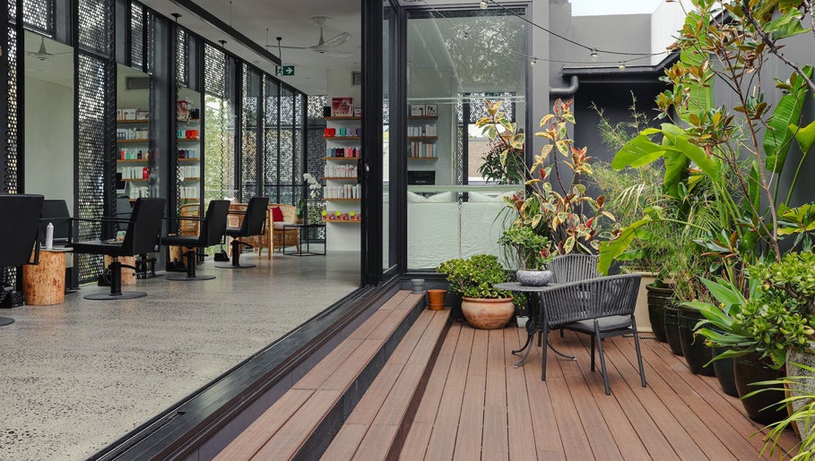 Elegant salon with lush plants at Willomina, Woollahra, New South Wales, AU.
