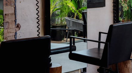 Chic salon chair and plants at Willomina, Woollahra, New South Wales, AU offering serene beauty experiences.