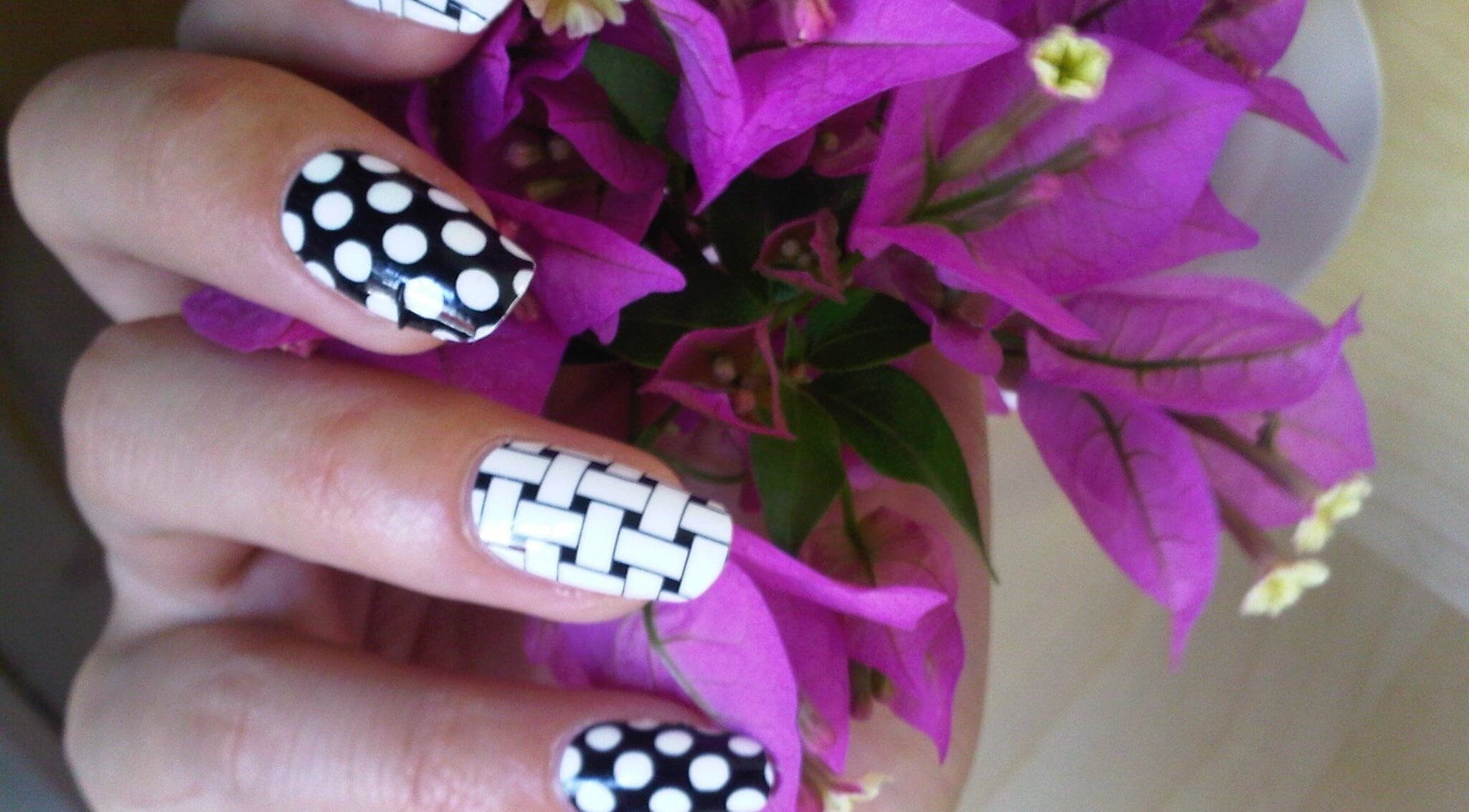Chic nail art with polka dots and patterns at American Nails by An, Amsterdam, Noord-Holland, NL.