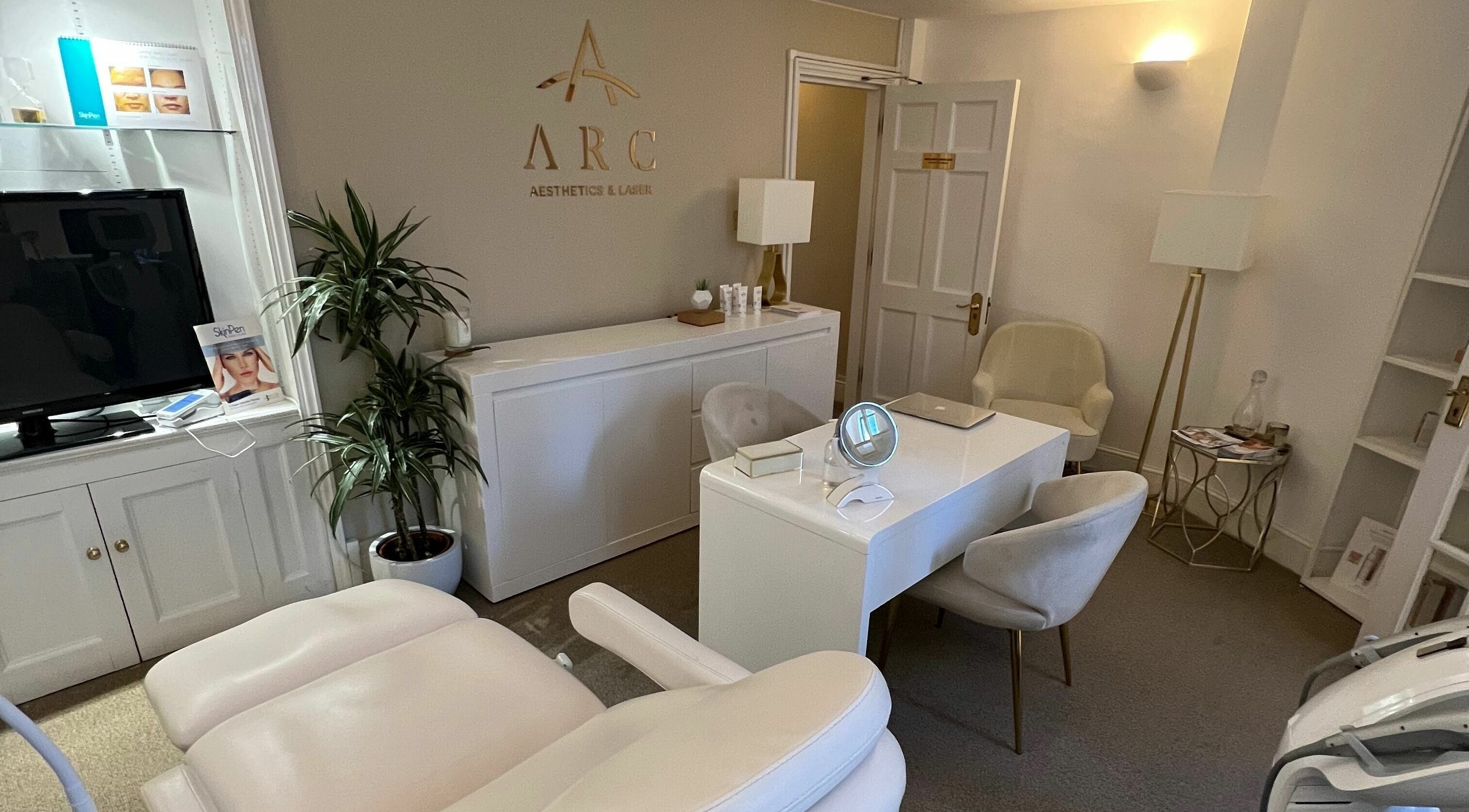 Modern and inviting treatment room at ARC Aesthetics and Laser in London, England, GB featuring plush seating.