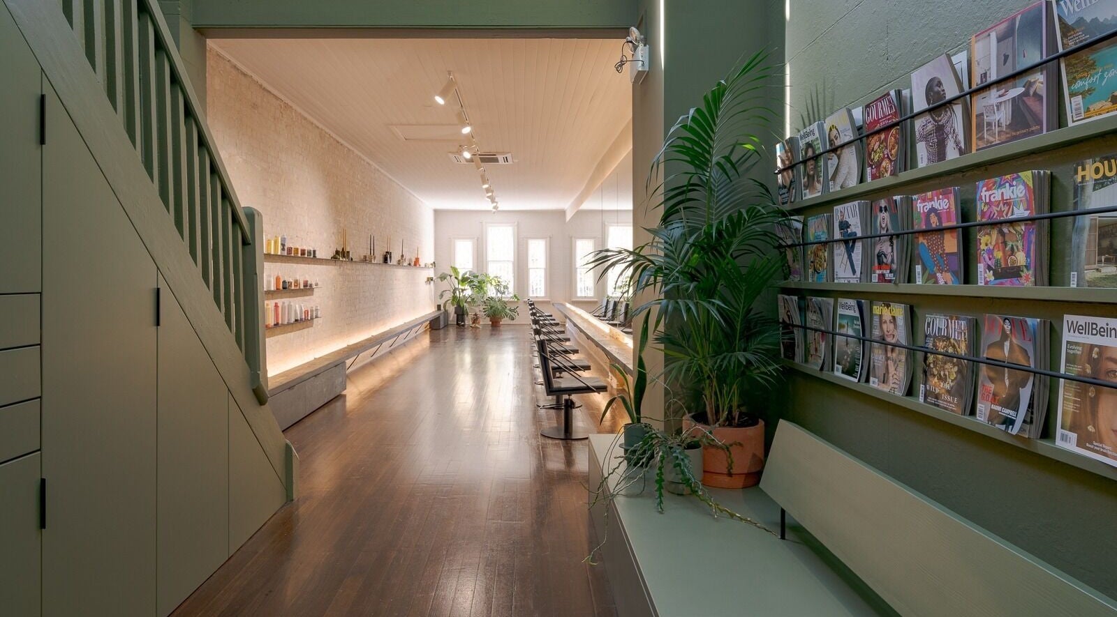 Chic interior of A_STUDIO with plants and magazines in Darlinghurst, New South Wales, AU.