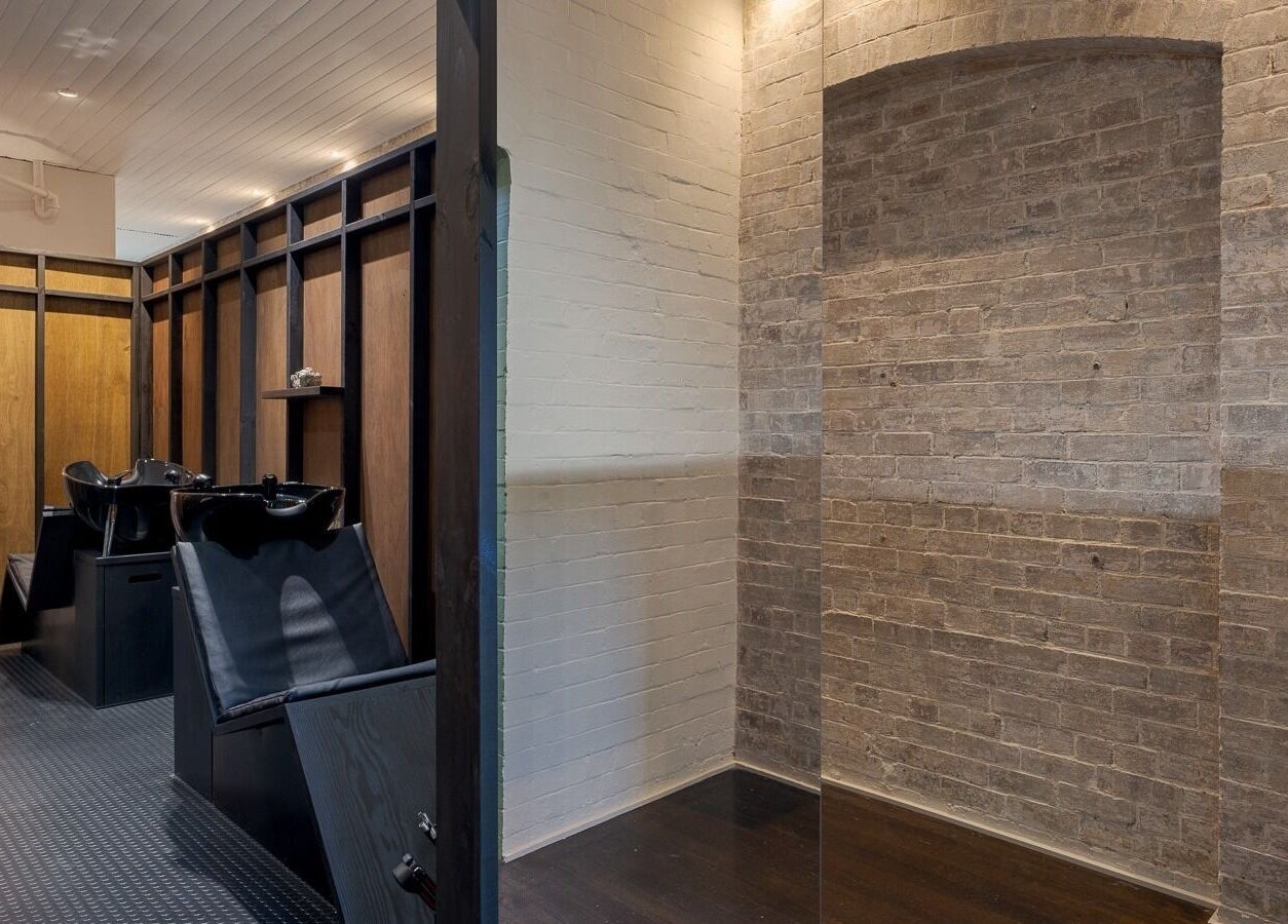 Sleek salon washing area at A_STUDIO, Darlinghurst, New South Wales, AU with modern design.