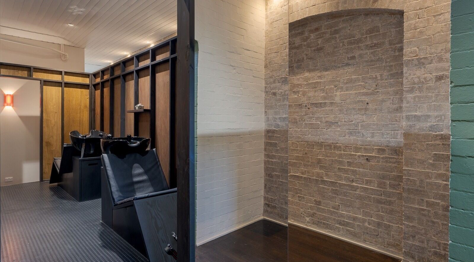 Sleek salon washing area at A_STUDIO, Darlinghurst, New South Wales, AU with modern design.