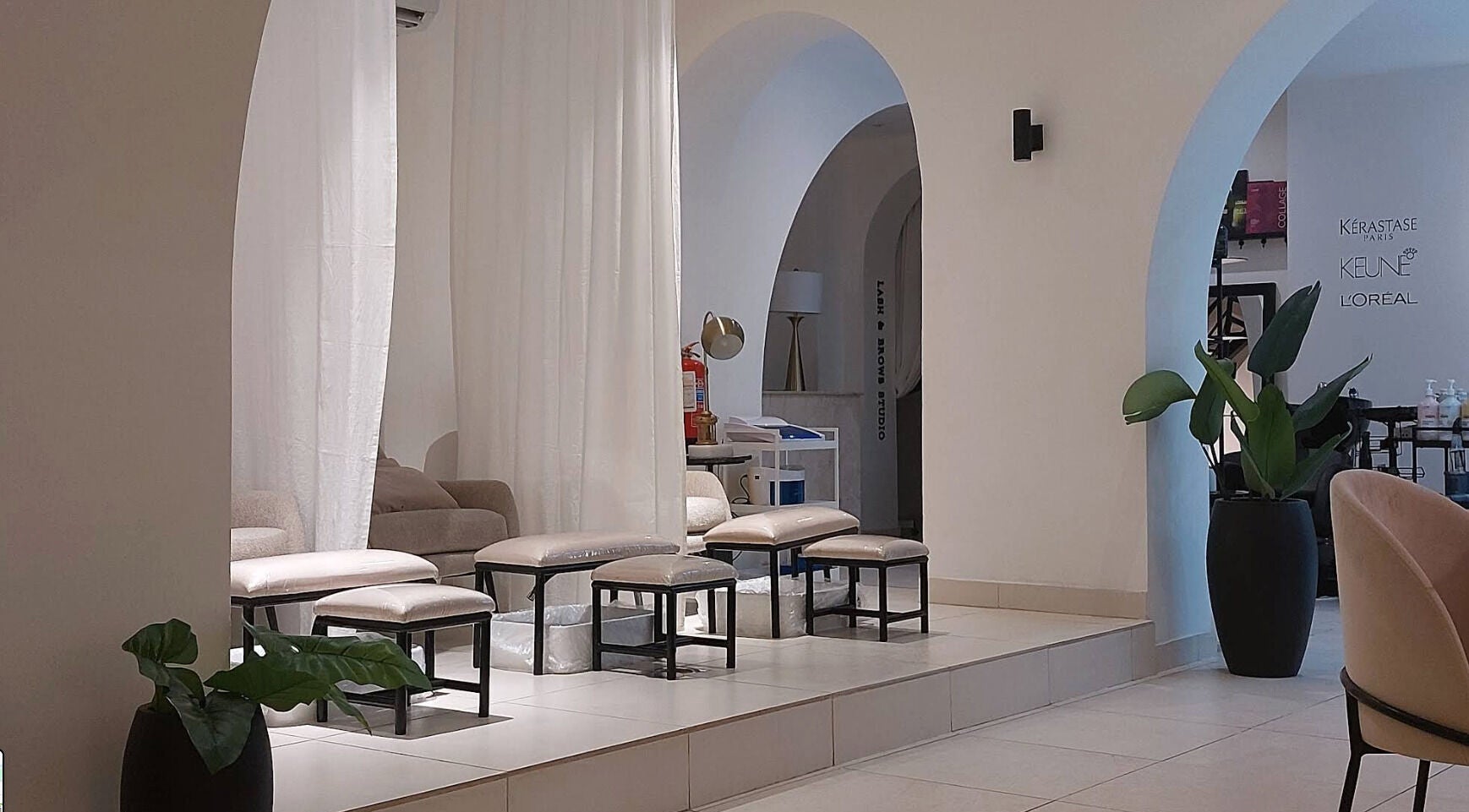 Relaxing interior of Beauty Vibes Salon in Al Khobar, Eastern Province, SA with elegant seating and decor.