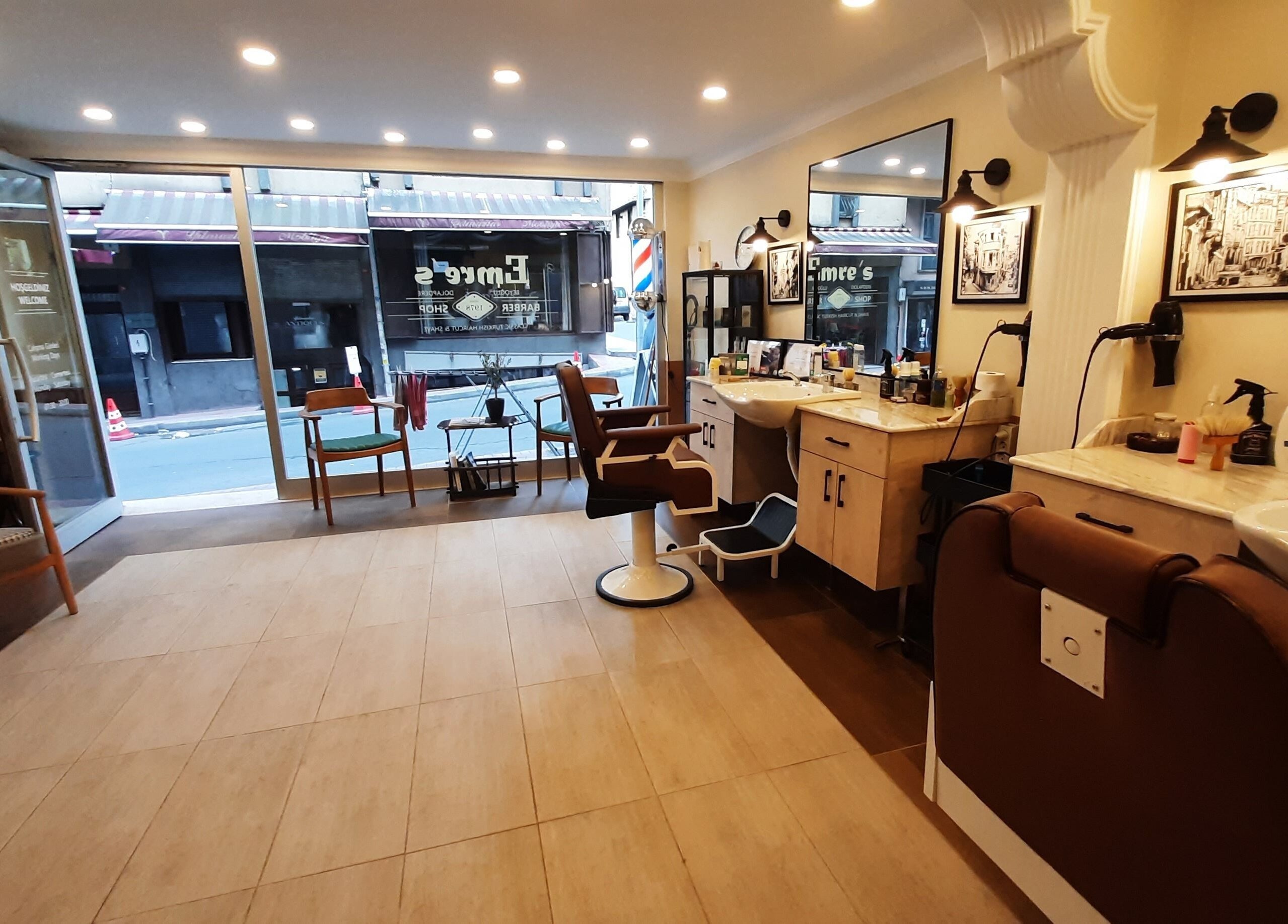 Inside view of Emre's Barbershop Dolapdere, chic seating and stylish decor in İstanbul, İstanbul, TR.