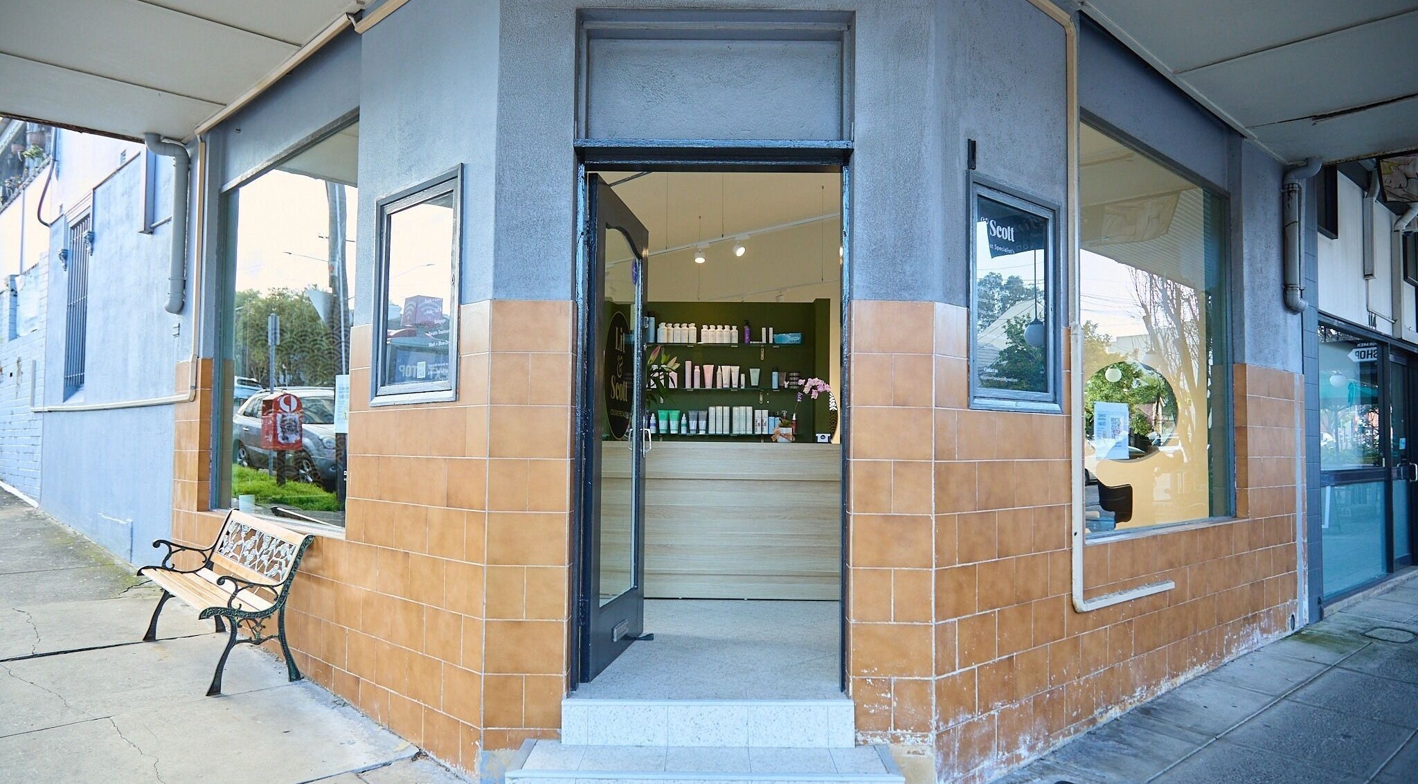 Entrance of Lit & Scott beauty venue in Stanmore, New South Wales, AU, showcasing stylish exterior and welcoming door.
