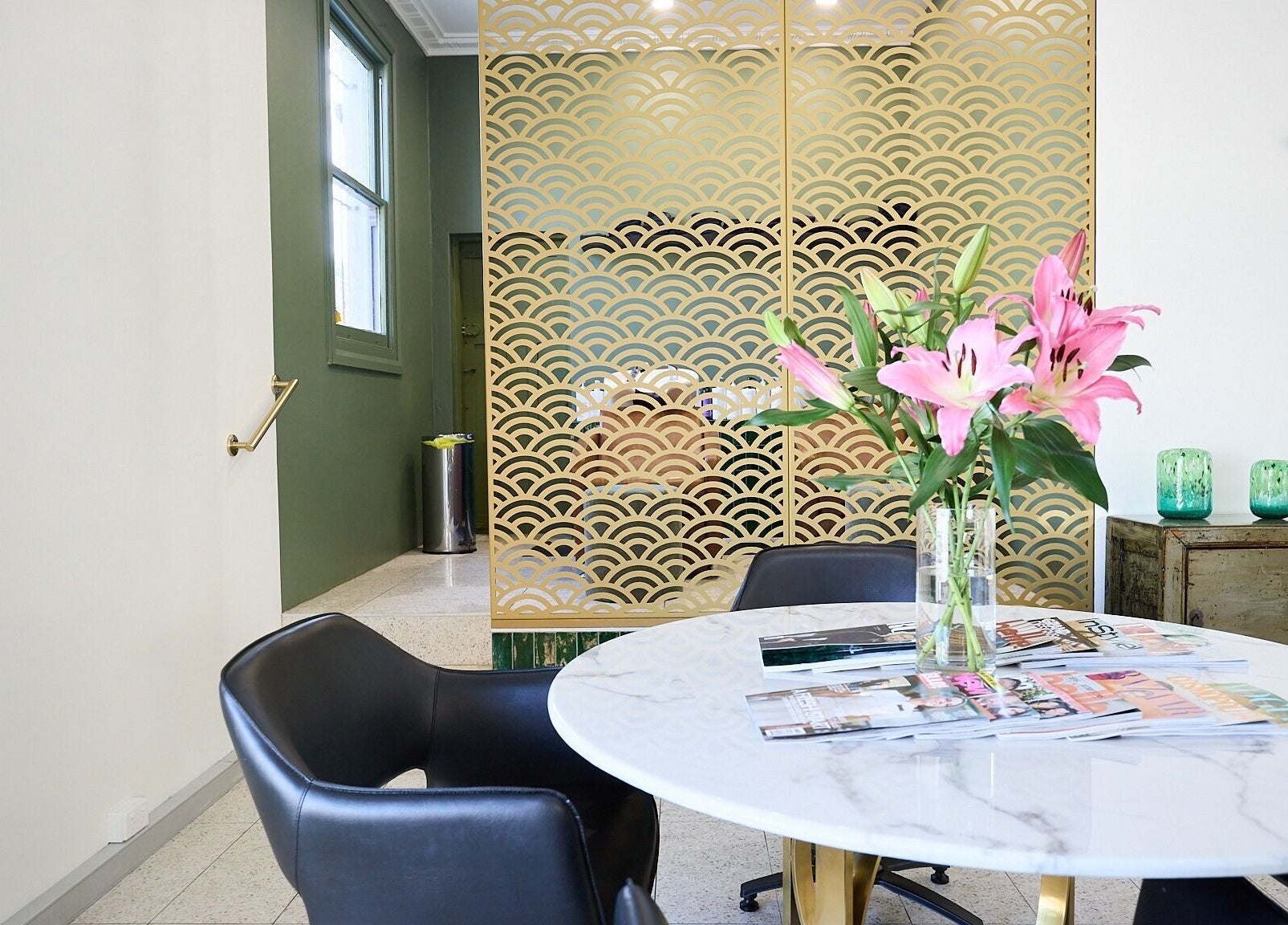 Stylish lounge with floral decor at Lit & Scott, Stanmore, New South Wales, AU, showcasing luxury and comfort.