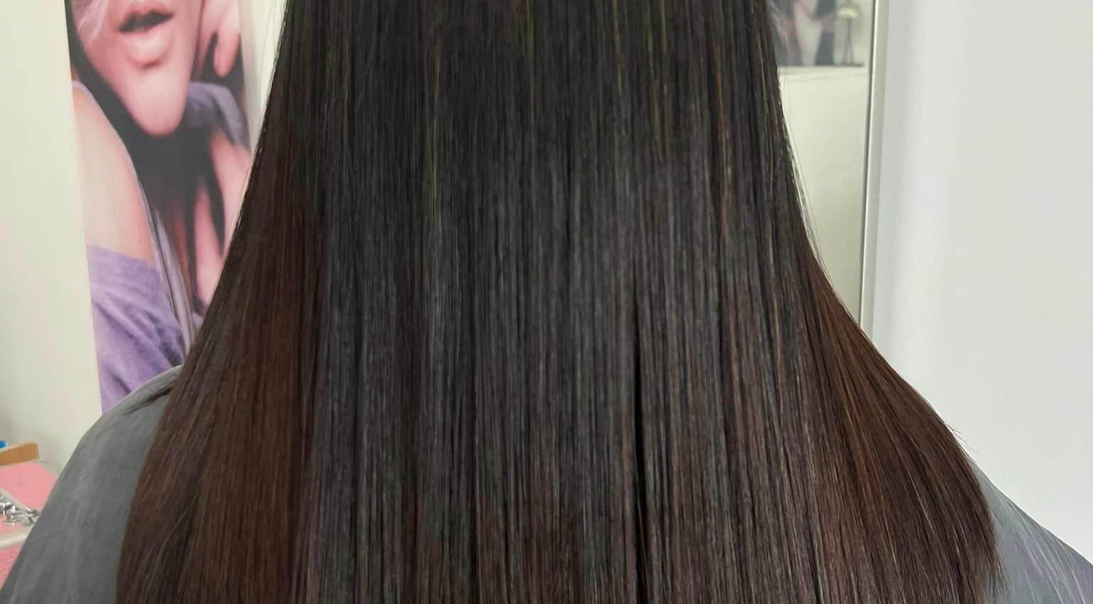 Smooth, sleek hair at Modern Touch Hair & Beauty, Melbourne, Victoria, AU showcasing expert hair styling.