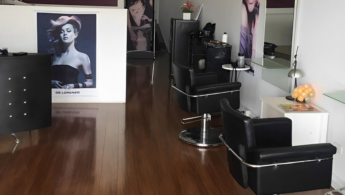 Modern salon interior with sleek chairs at Modern Touch Hair & Beauty, Melbourne, Victoria, AU.