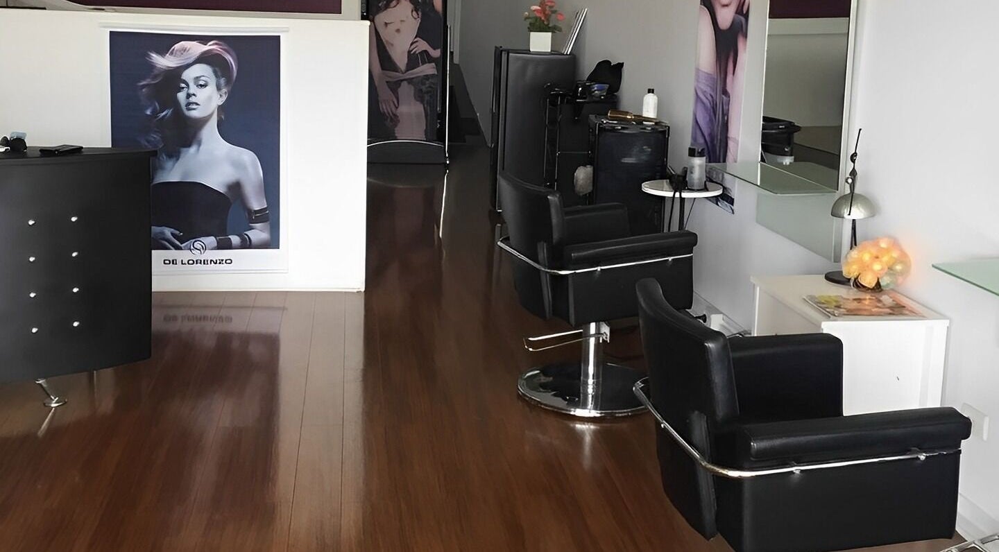 Modern salon interior with sleek chairs at Modern Touch Hair & Beauty, Melbourne, Victoria, AU.