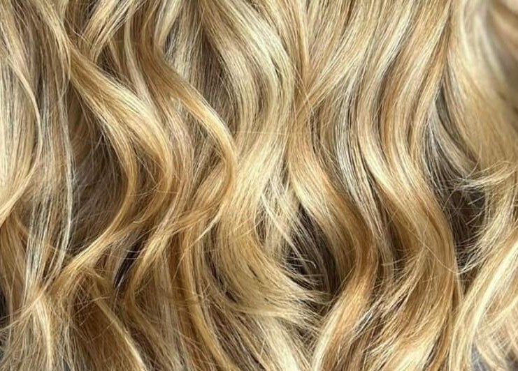Blonde wavy hair styled at Modern Touch Hair & Beauty, Melbourne, Victoria, AU.