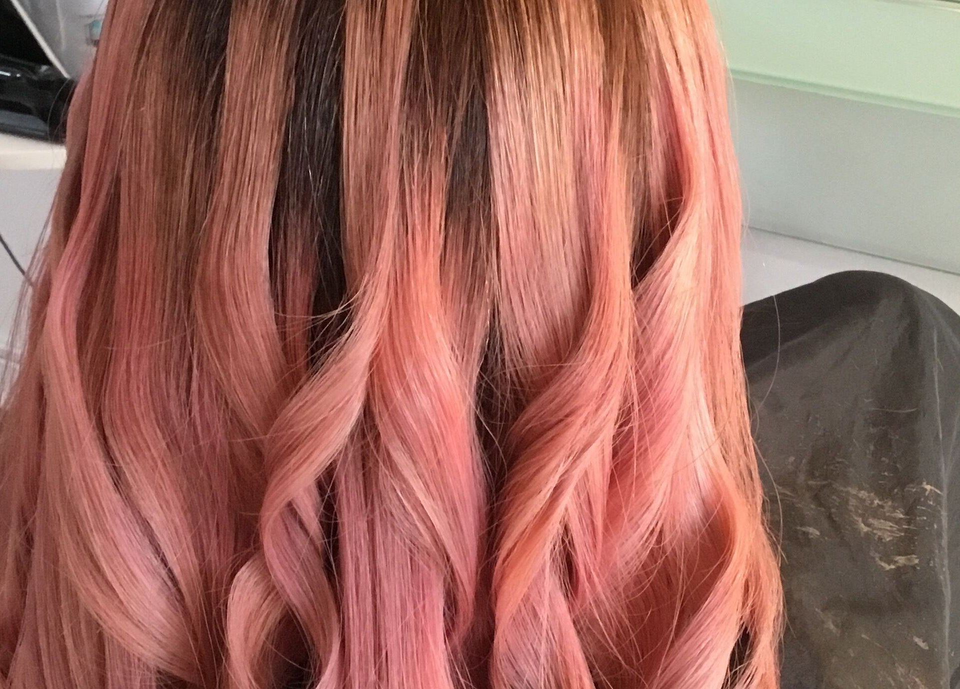 Elegant pink and brown curls styled at Modern Touch Hair & Beauty, Melbourne, Victoria, AU.