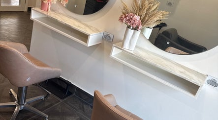 Elegant salon chairs and mirrors at Unique Hair by Lea, Catherine Field, New South Wales, AU.