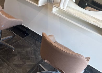 Elegant salon chairs at Unique Hair by Lea, Catherine Field, New South Wales, AU offer comfort and style.