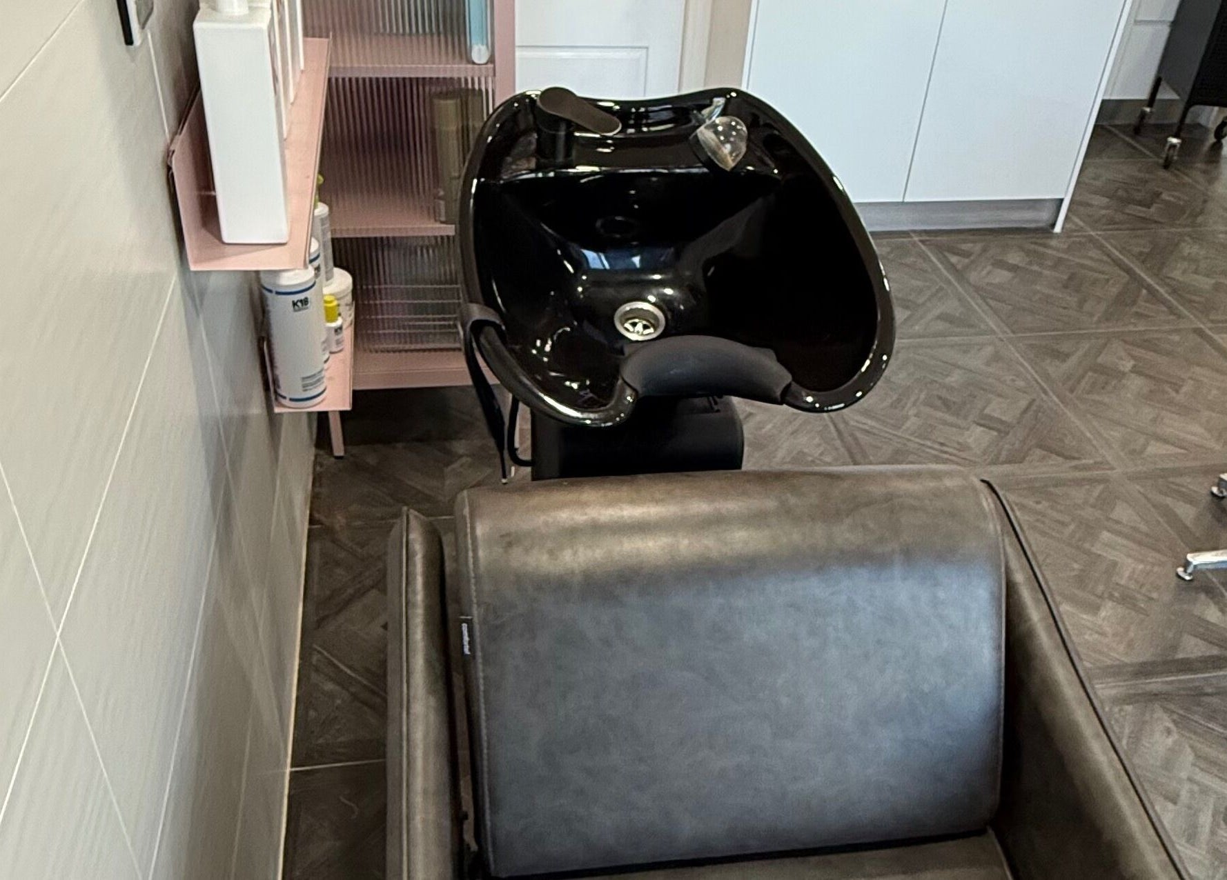 Modern shampoo station at Unique Hair by Lea, Catherine Field, New South Wales, AU, offering premium care.