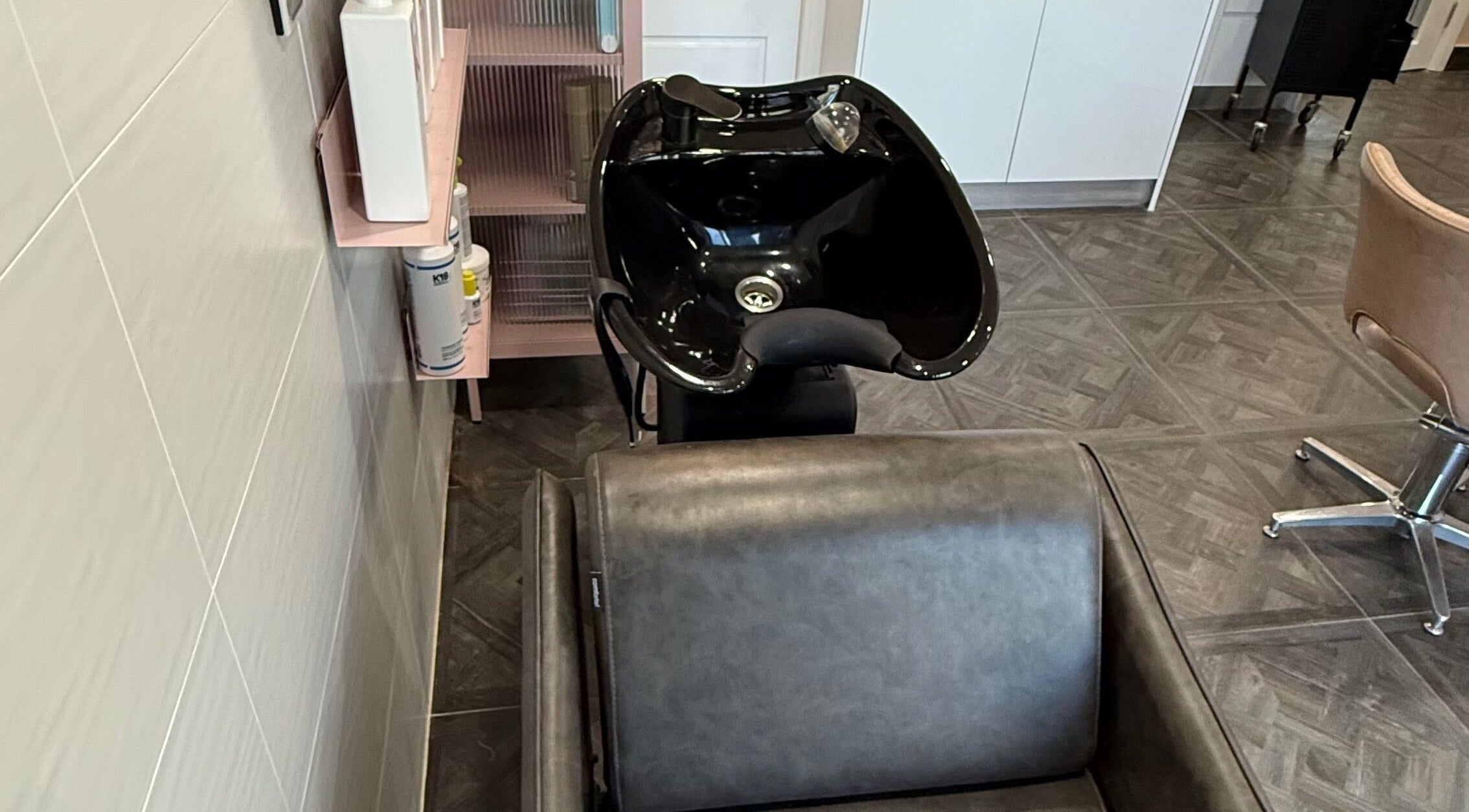 Modern shampoo station at Unique Hair by Lea, Catherine Field, New South Wales, AU, offering premium care.