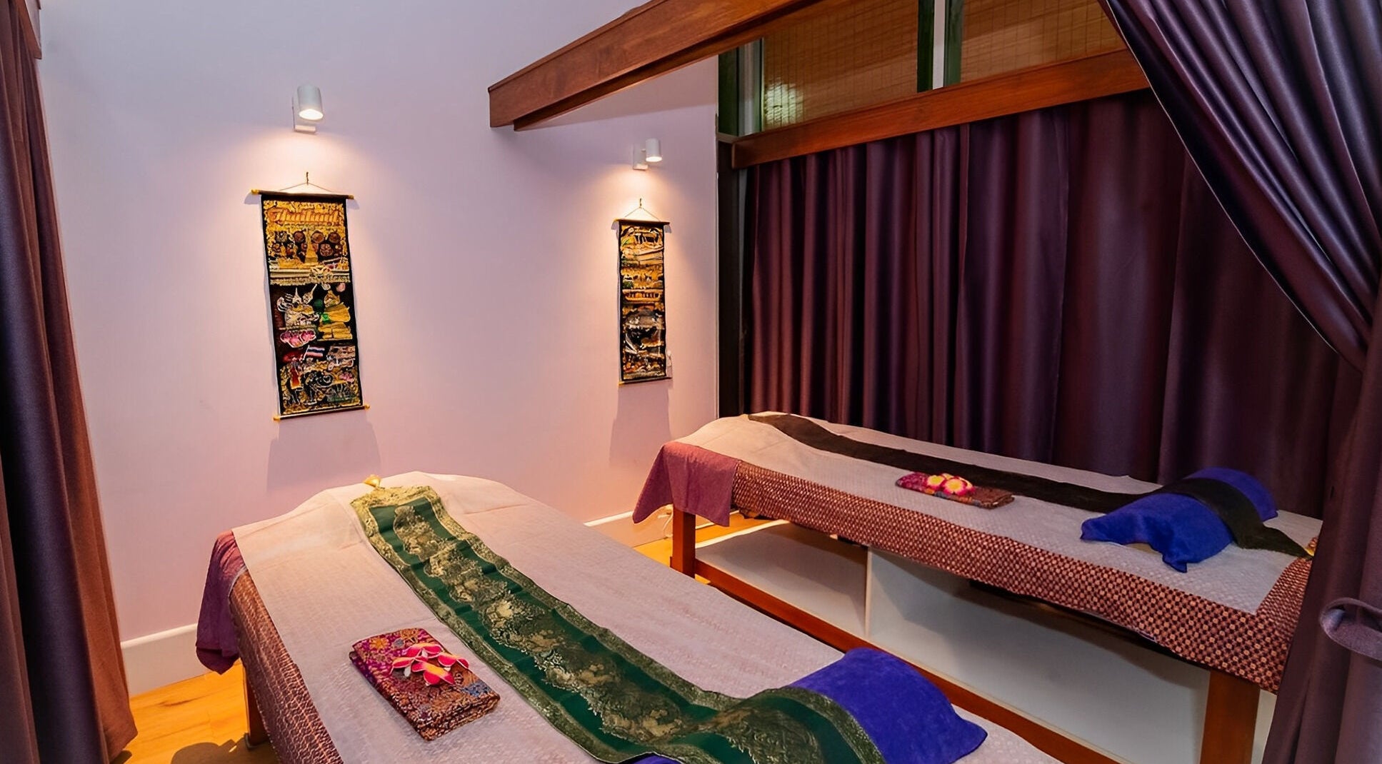 Tranquil massage room at TK Thai Massage Therapy in Penrith, New South Wales, AU, featuring two prepared beds.