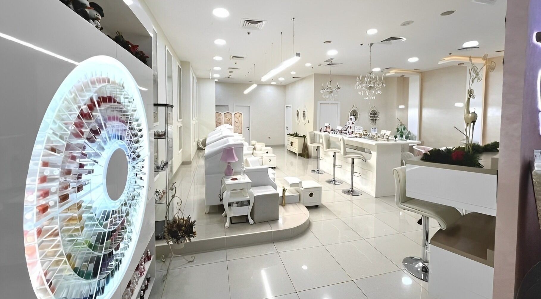 Modern interior of Polished Nail Spa - Downtown in Dubai, AE, featuring elegant nail stations and chic decor.