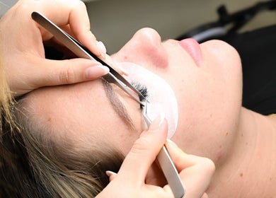 Eyelash extension service at Love Mon Beauty Spa in Hollywood, Florida, US for lush, natural lashes.