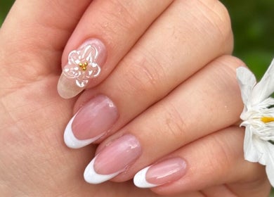 Elegantly designed floral French manicure at Love Mon Beauty Spa, Hollywood, Florida, US.