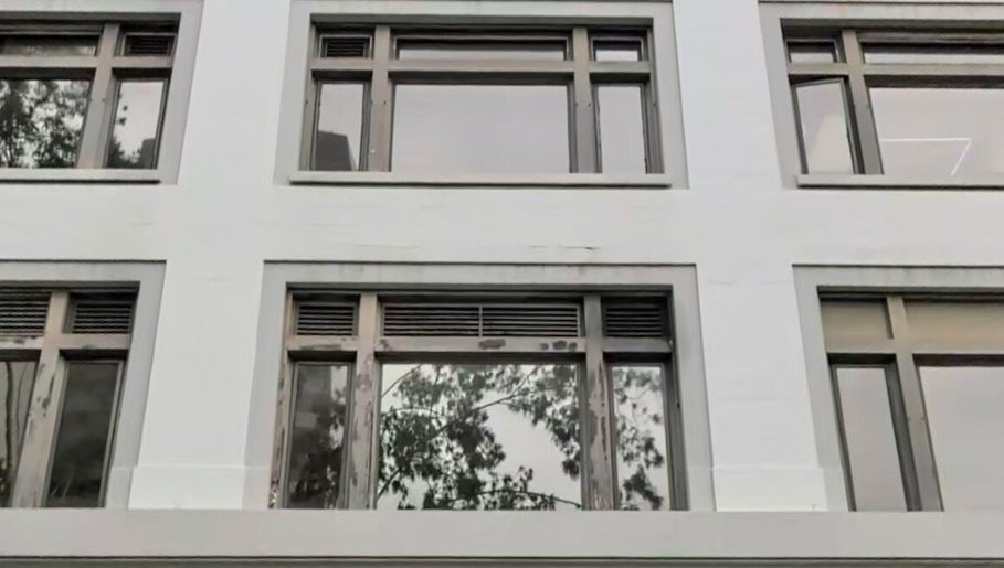 Front view of Valencia Snow building in San Diego, California, US with large windows and modern design.