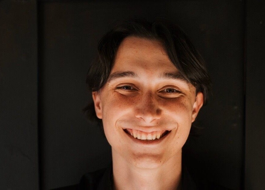 Smiling individual at Regents of Beverley, Beverley, England, GB, symbolizes warm wellness atmosphere.