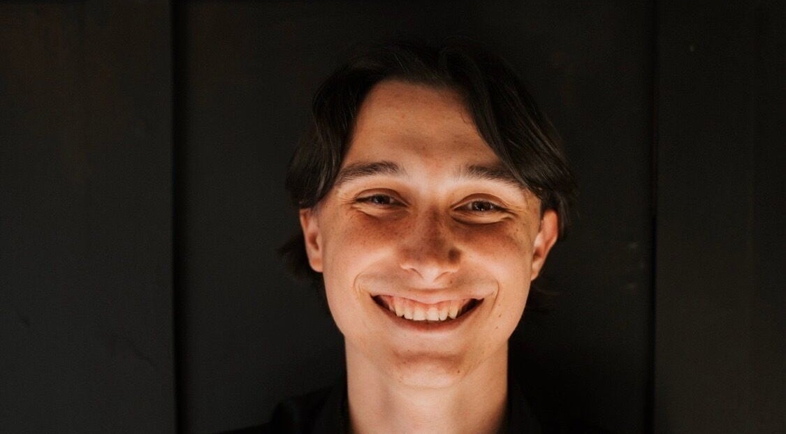 Smiling individual at Regents of Beverley, Beverley, England, GB, symbolizes warm wellness atmosphere.