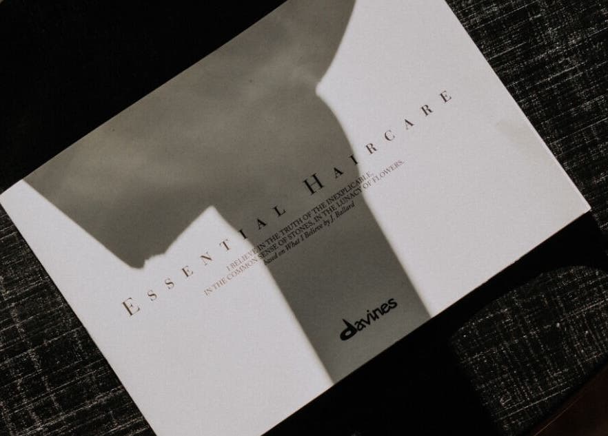 Davines Essential Haircare brochure at Regents of Beverley, Beverley, England, GB, showcasing beauty offerings.