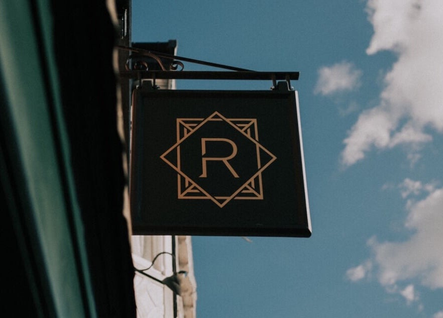 Exterior signage of Regents of Beverley spa in Beverley, England, GB against a clear sky.