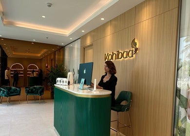 Stylish reception area at Home Service, Dubai, AE with chic interior design and modern decor.