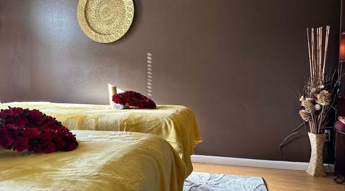 Serene massage room at Royal Thai Massage And Spa, Kapolei, Hawaii, US with elegant decor and warm lighting.