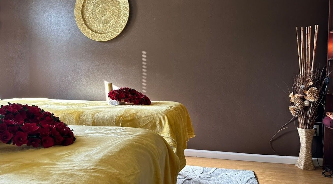 Serene massage room at Royal Thai Massage And Spa, Kapolei, Hawaii, US with elegant decor and warm lighting.