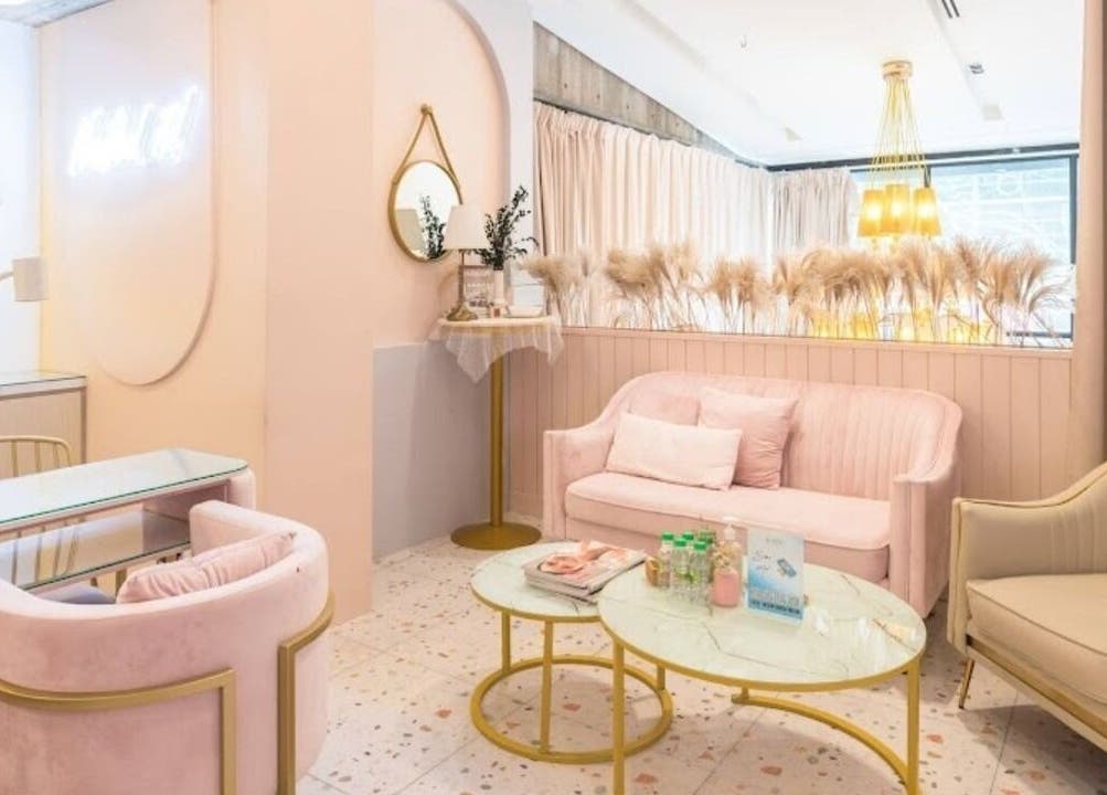 Elegant pastel pink and white lounge at 176 Avenue at Bangsar, Kuala Lumpur, offering a tranquil wellness escape.