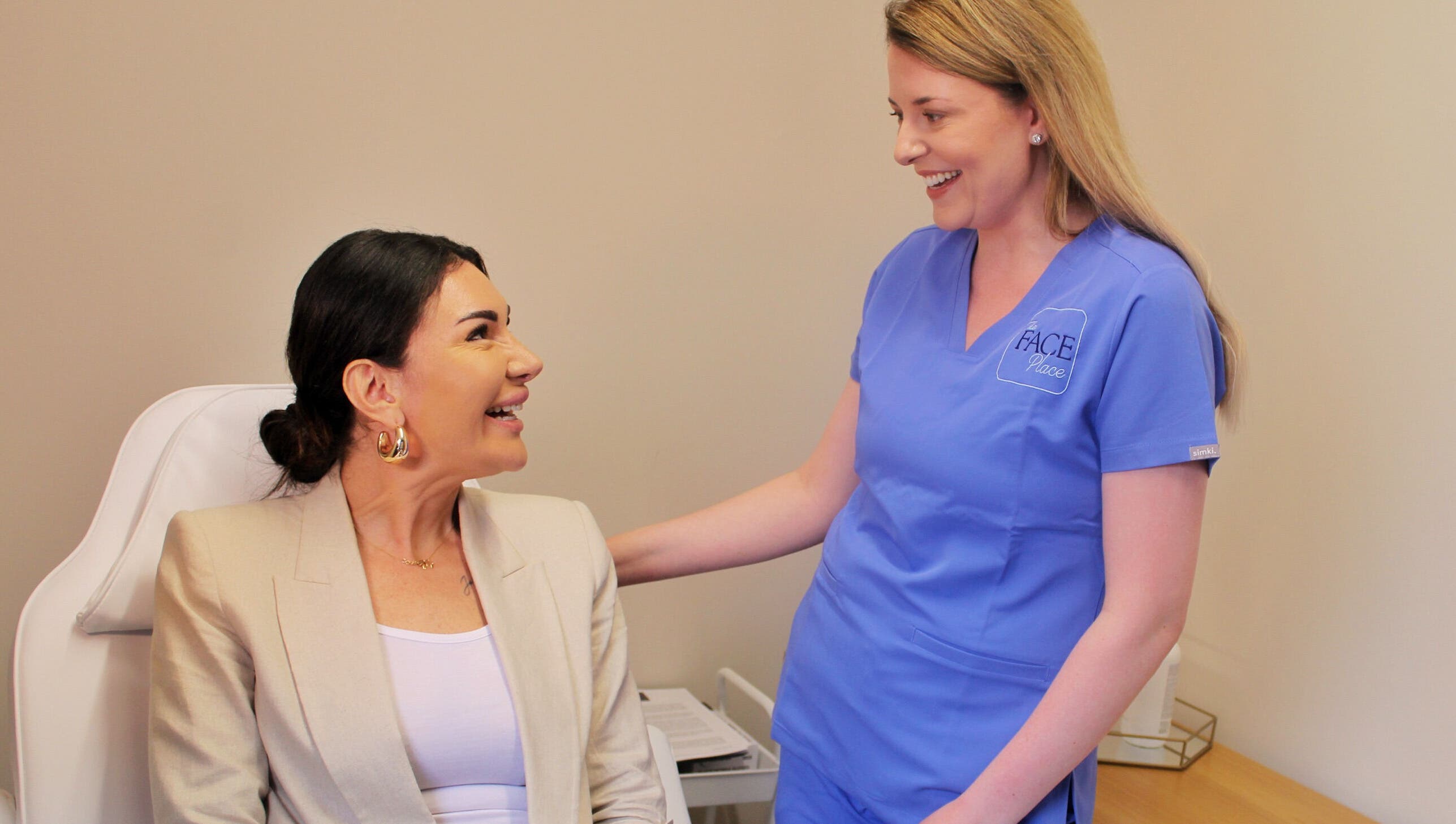 Client consultation at The Face Place, Inverness, Scotland, GB. Expert advice in a serene atmosphere.