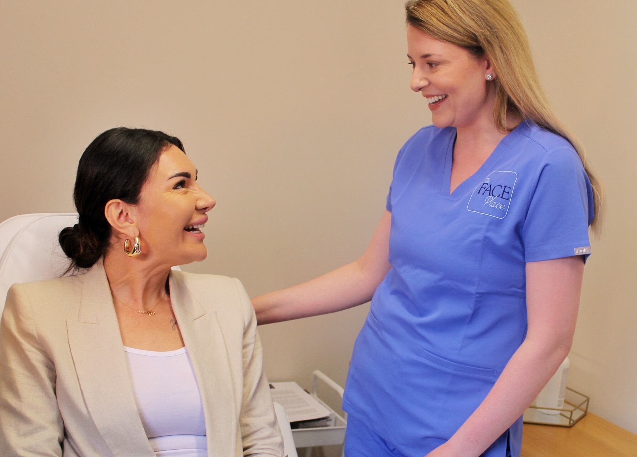 Client consultation at The Face Place, Inverness, Scotland, GB. Expert advice in a serene atmosphere.