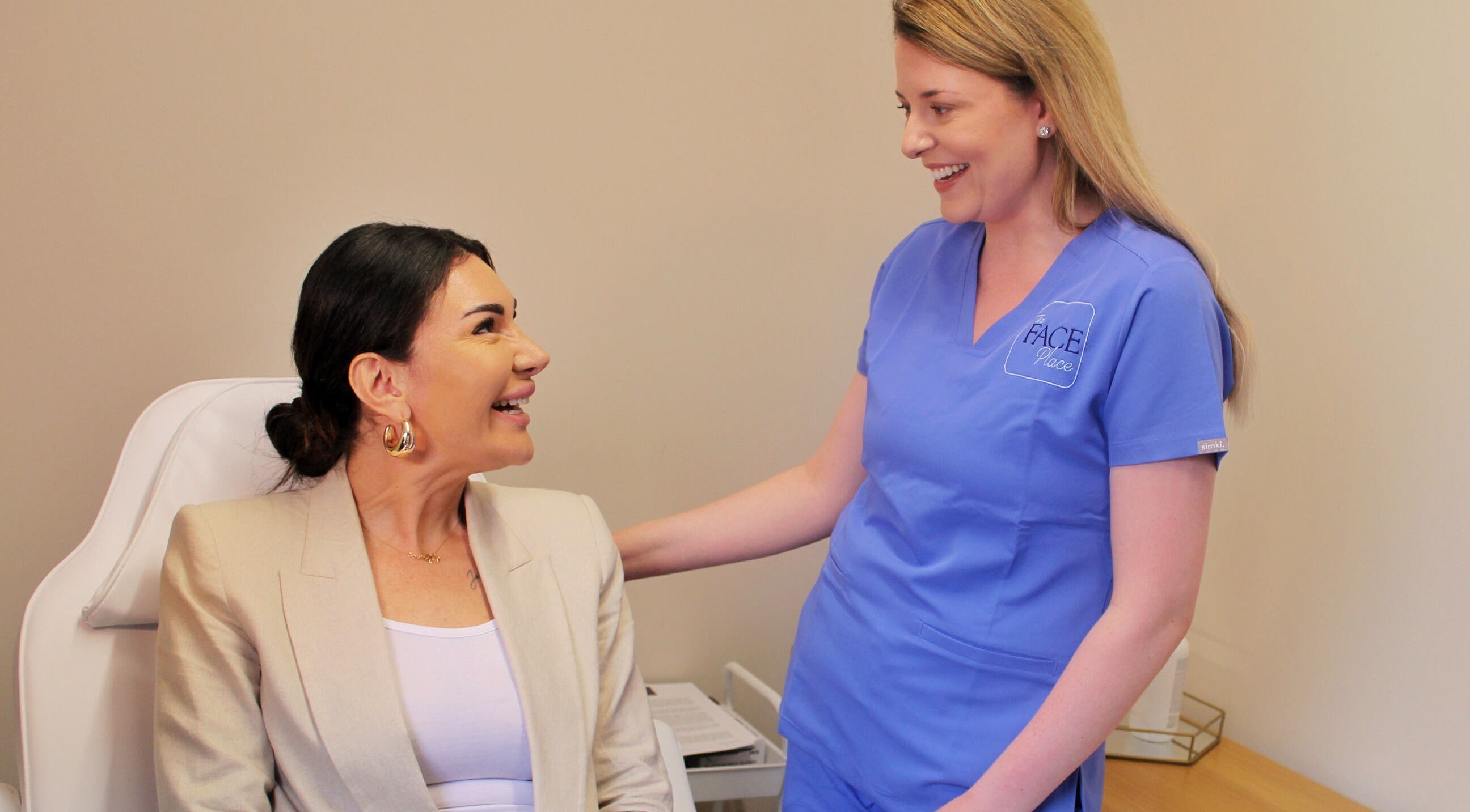 Client consultation at The Face Place, Inverness, Scotland, GB. Expert advice in a serene atmosphere.