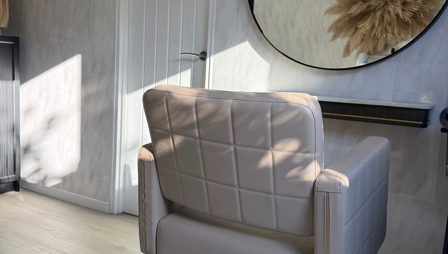 Luxurious salon chair at Victorium Hair and Extensions in Exmouth, England, GB, exuding elegance and style.