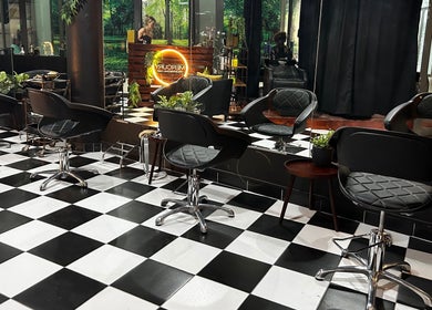 Mercury Professional Hair and Beauty, Sandton, Gauteng, ZA interior with stylish chairs and mirrors.