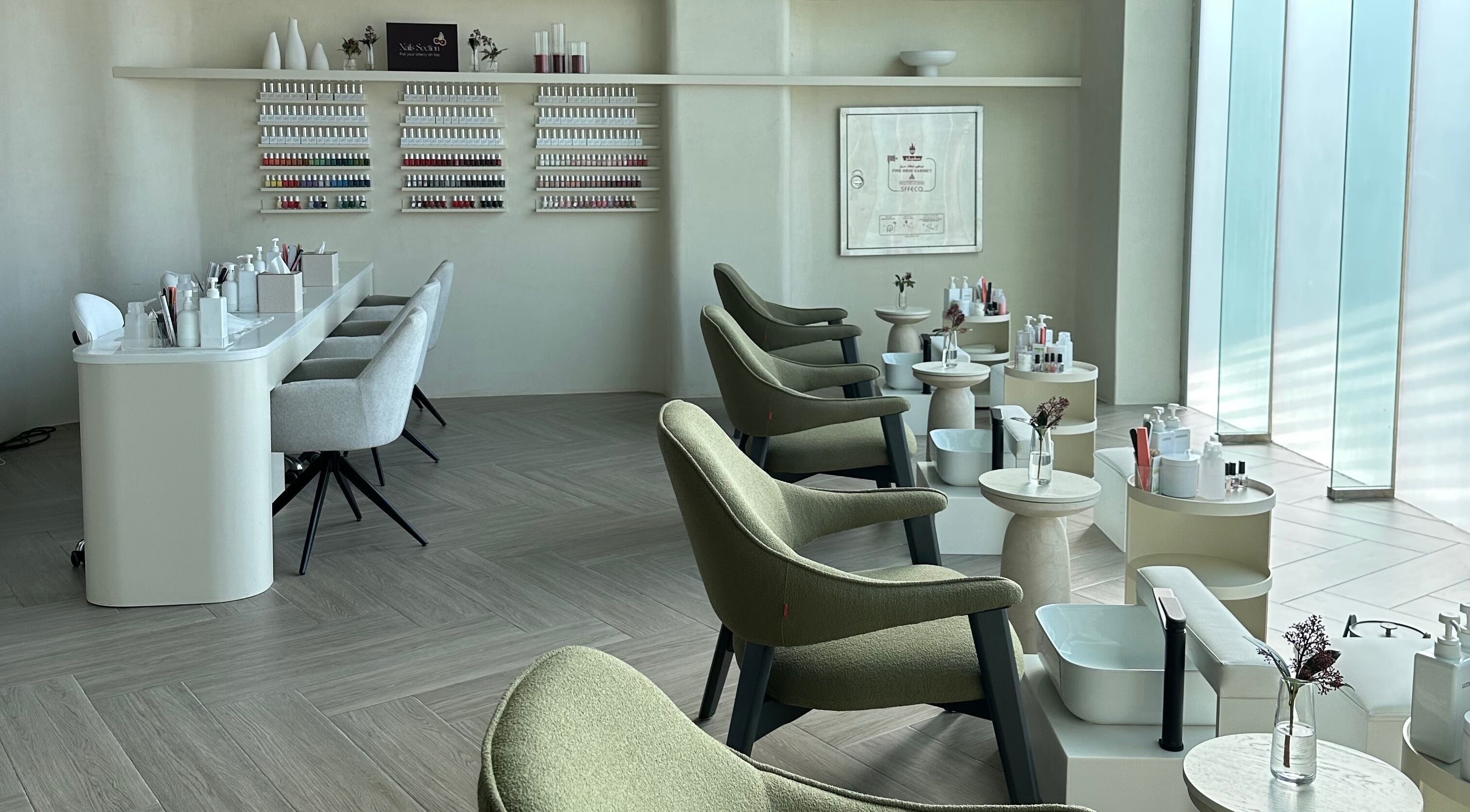 Chic interior of Treat. Beauty Salon in Al Khobar, Eastern Province, SA, highlighting manicure stations.